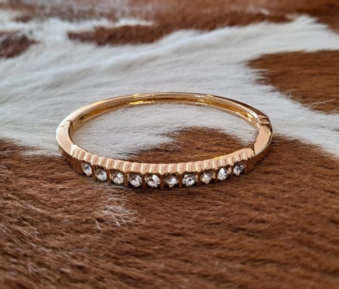 Gold Hinged Bangle Bracelet with Rhinestone Bar Accent